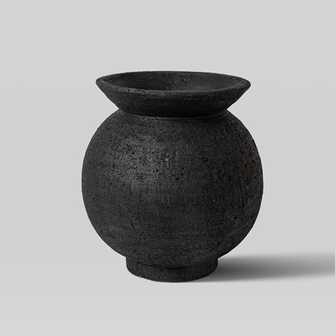 Svart kruka av terracotta